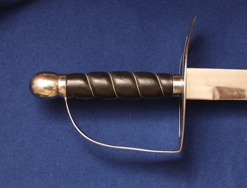Referência fotográfica do sabre sobre fundo azul